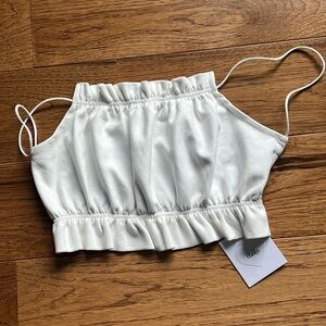Adika size small faux suede white crop top open back NWT